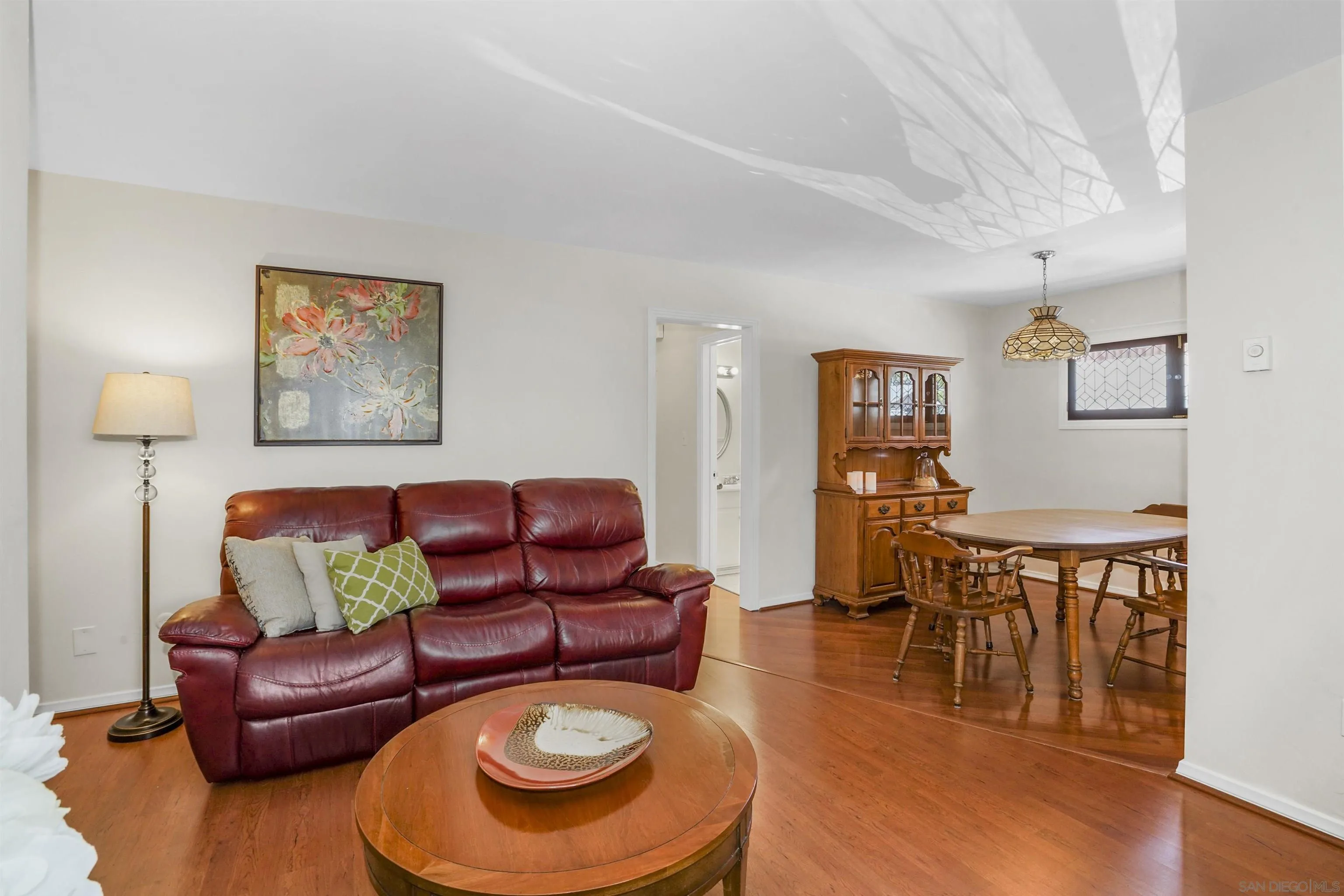734 E Avenue Coronado, CA 92118 - Photo 4 of 30 a living room with furniture and wooden floor