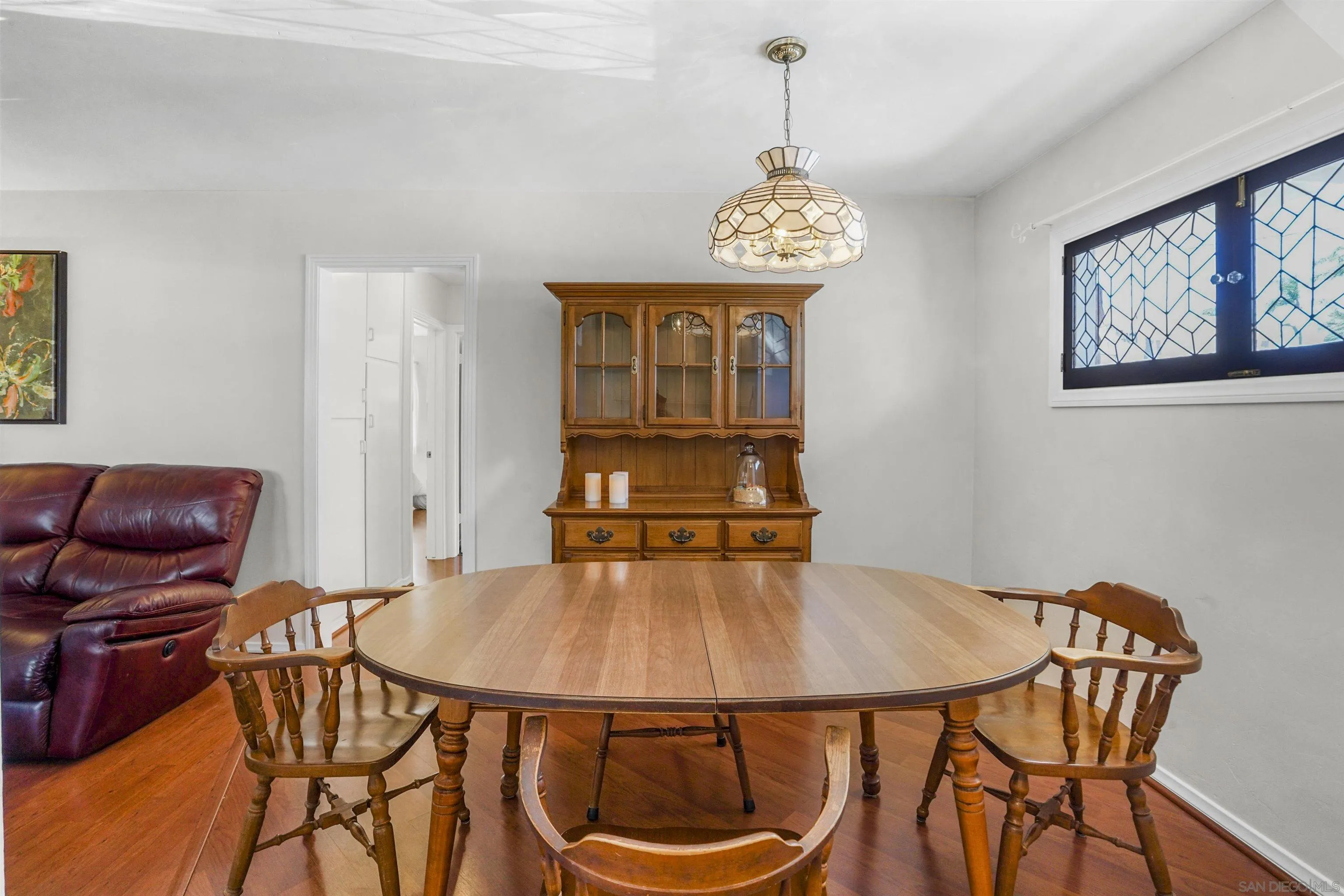 734 E Avenue Coronado, CA 92118 - Photo 9 of 30 a view of a dining room with furniture