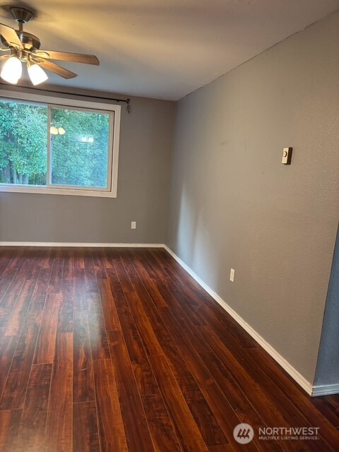 9735 Littlerock Road Southwest Olympia, WA 98512 - Photo 13 of 30 a view of room with window and wooden floor