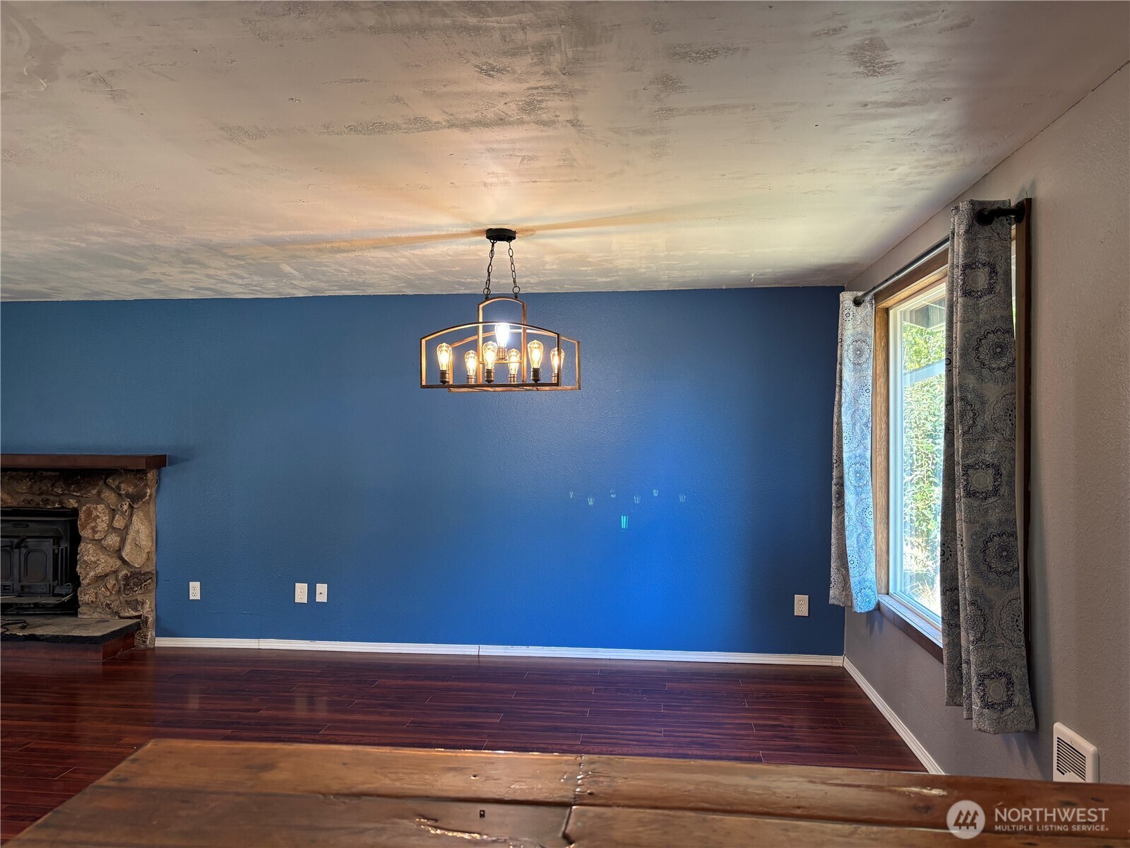 9735 Littlerock Road Southwest Olympia, WA 98512 - Photo 8 of 30 a view of empty room with wooden floor and window