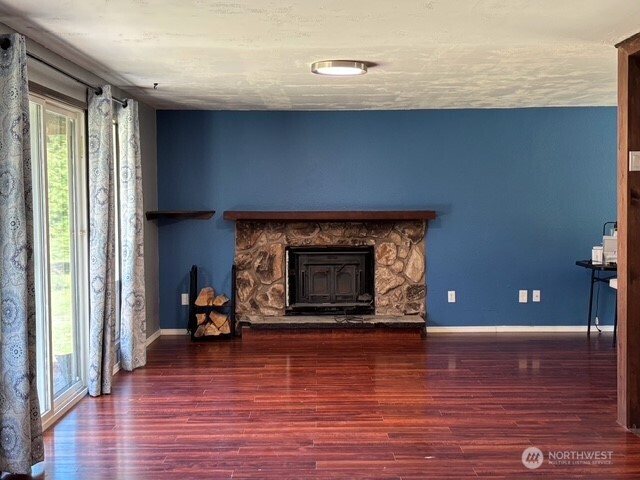 9735 Littlerock Road Southwest Olympia, WA 98512 - Photo 10 of 30 a living room with furniture and a fireplace