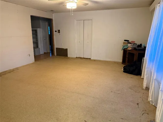 an empty room with closet