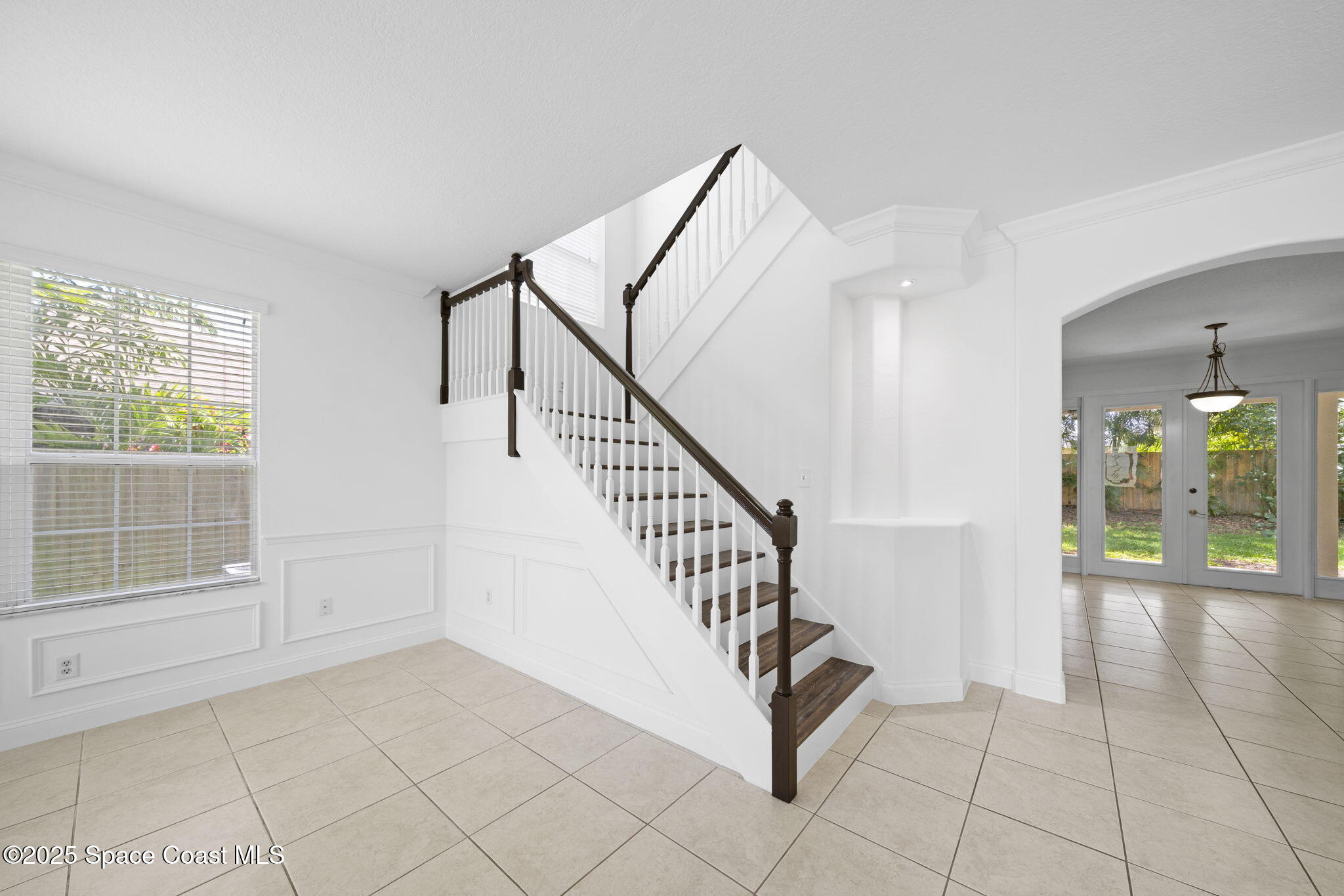 504 Glenbrook Circle Rockledge, FL 32955 - Photo 18 of 40 a view of entryway and hall with a bath tub