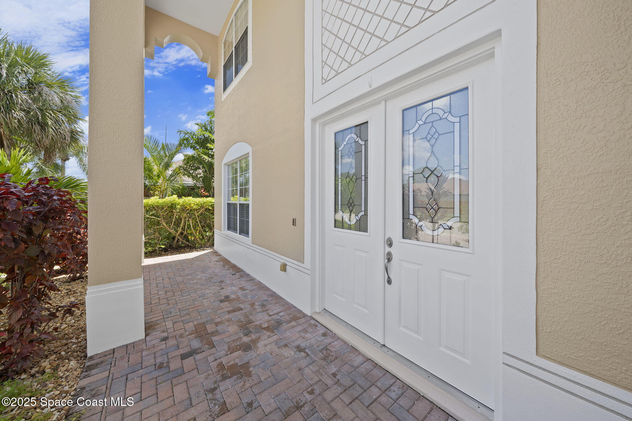 504 Glenbrook Circle Rockledge, FL 32955 - Photo 3 of 40 a view of a door and chair in the balcony