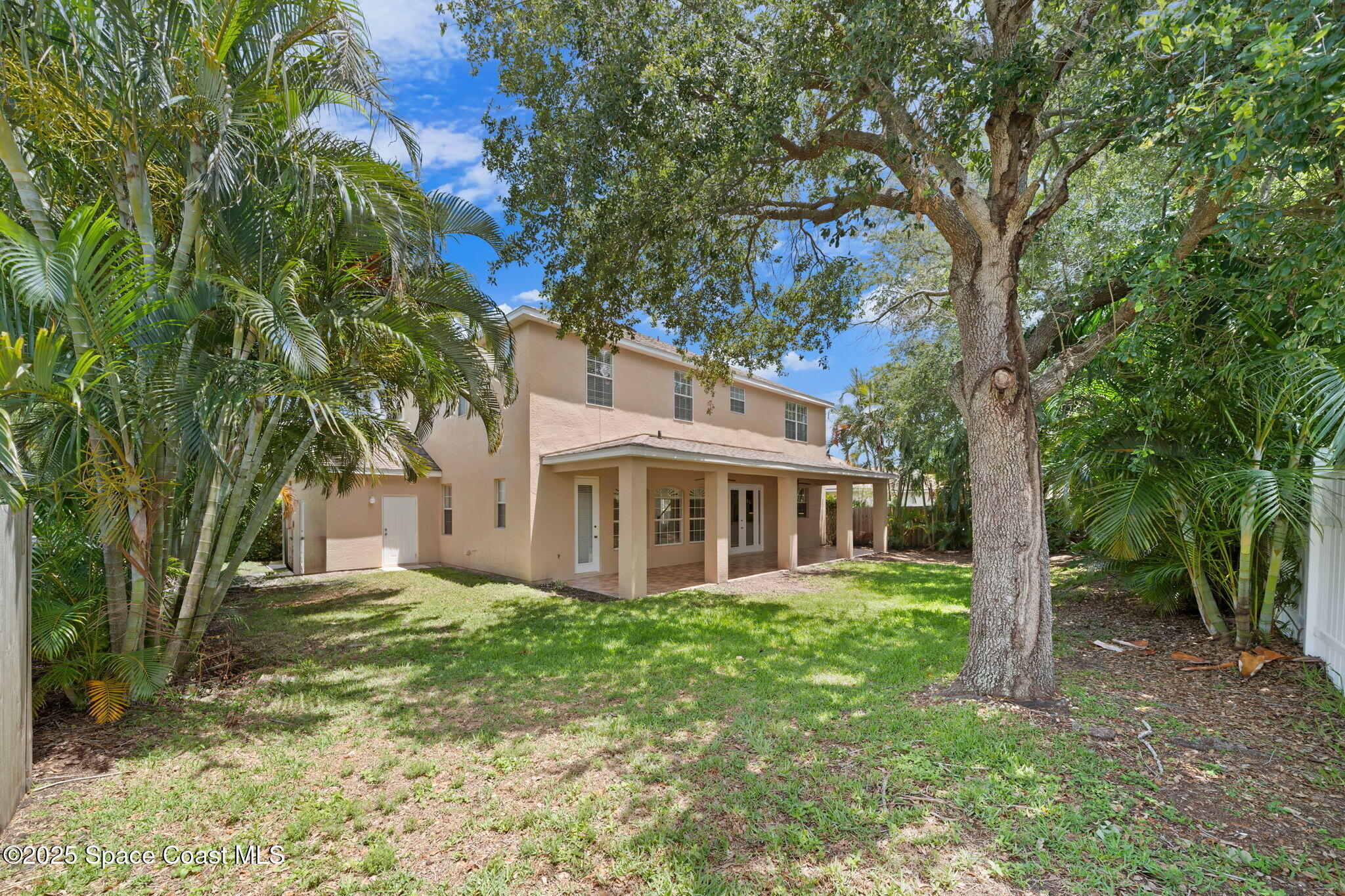 504 Glenbrook Circle Rockledge, FL 32955 - Photo 37 of 40 front view of a house with a yard
