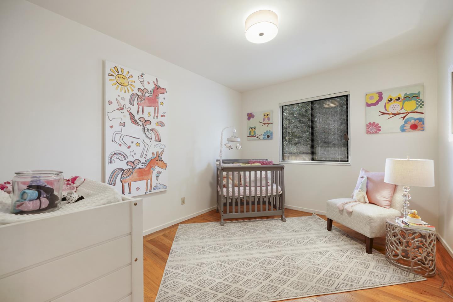 348 San Pablo Avenue Millbrae, CA 94030 - Photo 13 of 20 a bedroom with furniture and wooden floor