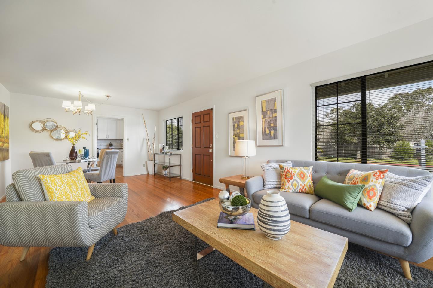 348 San Pablo Avenue Millbrae, CA 94030 - Photo 5 of 20 a living room with furniture and a large window