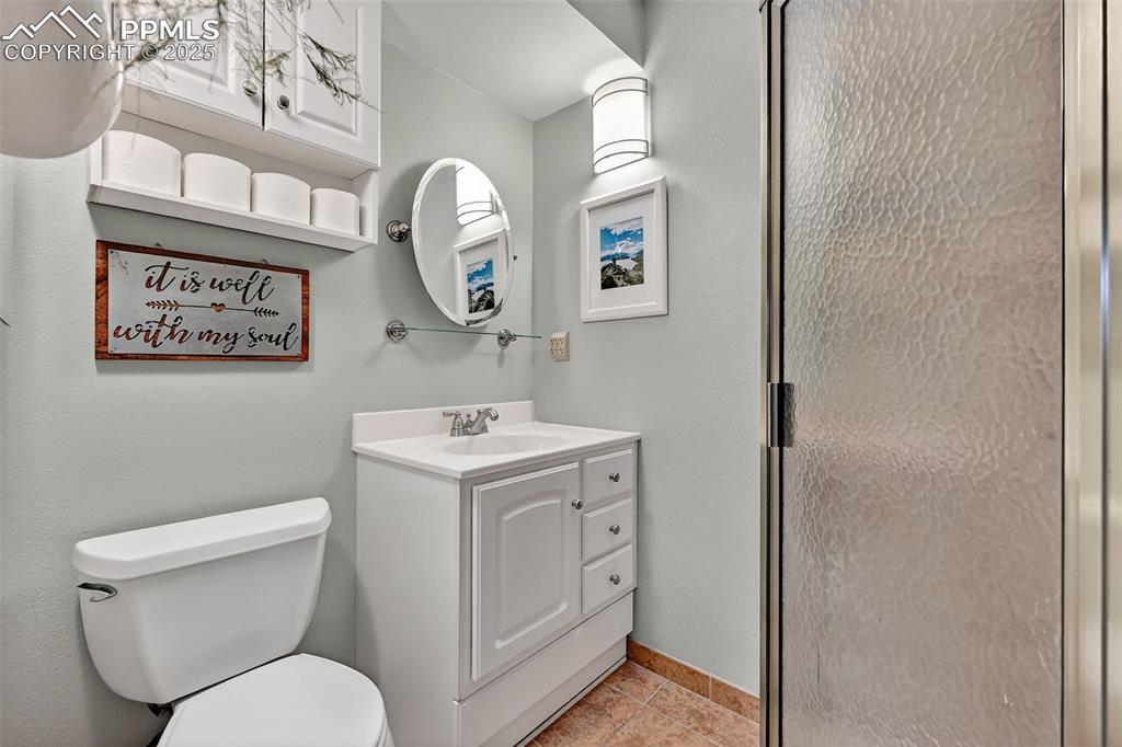 3102 Brenner Place Colorado Springs, CO 80917 - Photo 19 of 38 a bathroom with a toilet and a sink