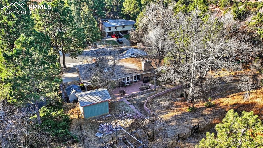 3102 Brenner Place Colorado Springs, CO 80917 - Photo 38 of 38 an aerial view of a house with yard swimming pool and outdoor seating