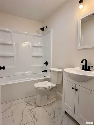 a bathroom with a sink a toilet and a bathtub