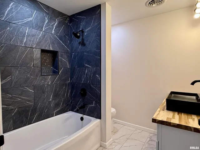 a bathroom with a bathtub