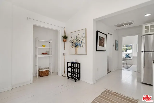 a view of livingroom with hardwood and furniture