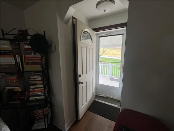 a view of staircase with wooden floor and stairs