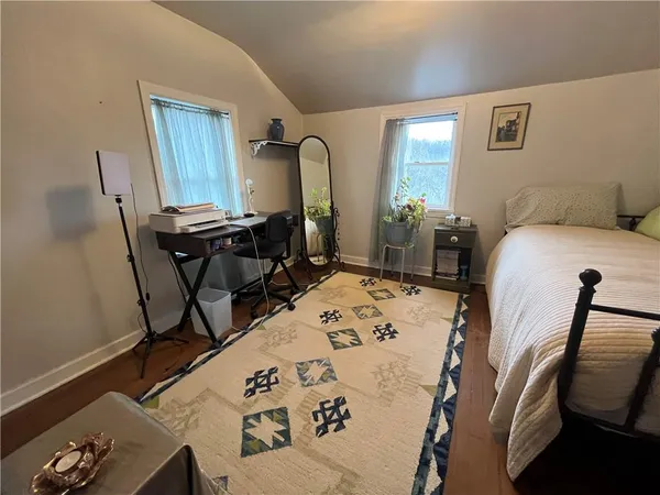 a room with gym equipment and a mirror