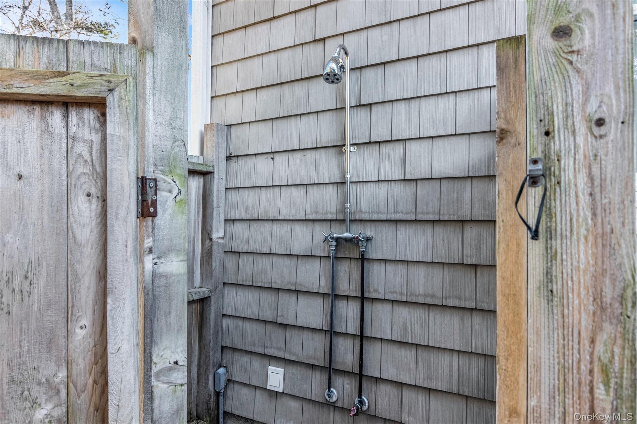 435 Luptons Point Road Mattituck, NY 11952 - Photo 16 of 27 a view of a small room with wooden shelves