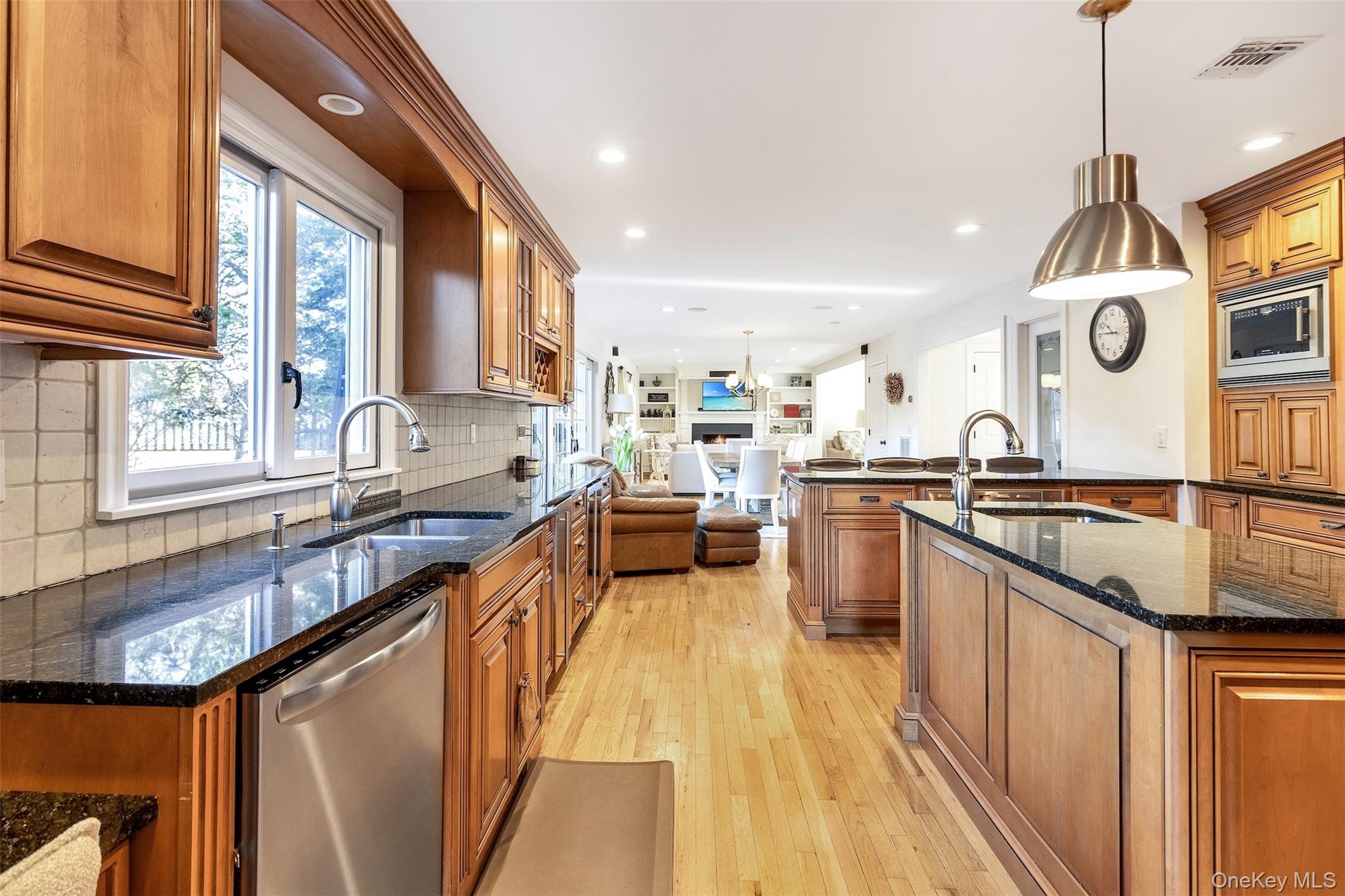 435 Luptons Point Road Mattituck, NY 11952 - Photo 4 of 27 a kitchen with granite countertop lots of counter top space and stainless steel appliances
