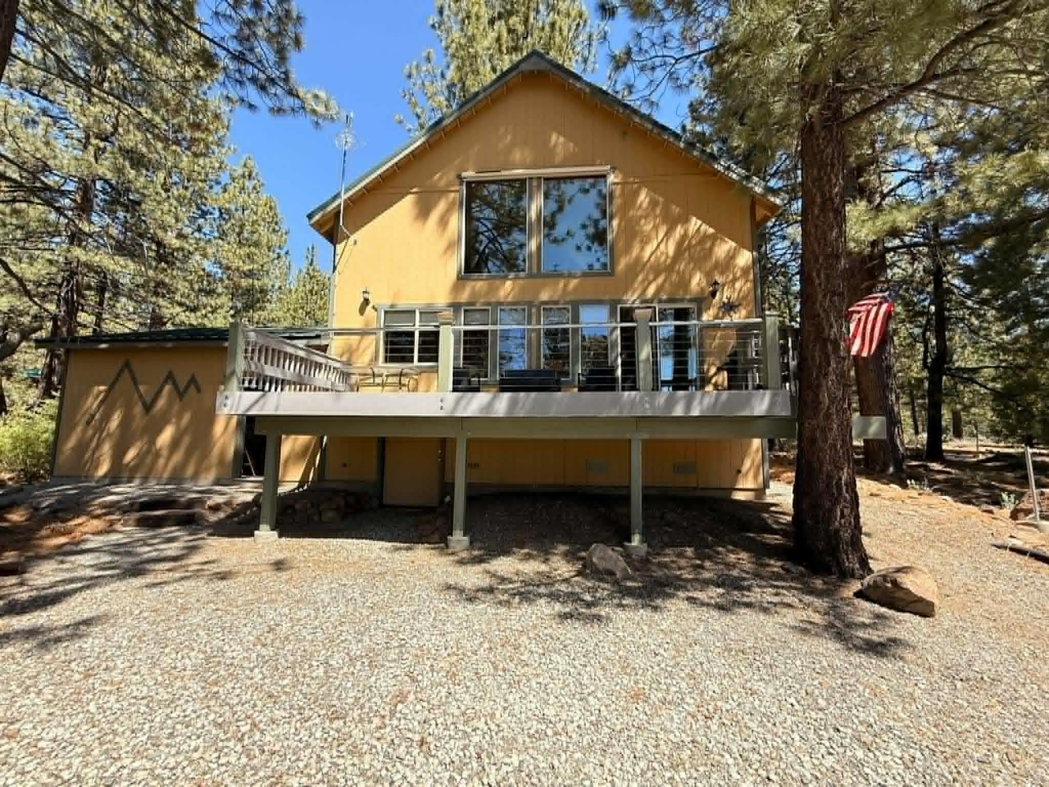 93 Juniper Road Beckwourth, CA 96129 - Photo 29 of 35 a front view of a house with a yard