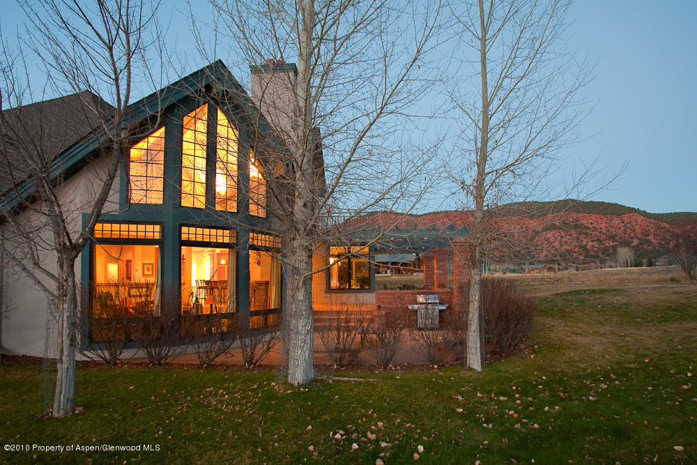 254 Diamond A Ranch Road Carbondale, CO 81623 - Photo 5 of 12 a backyard of a house with lots of green space