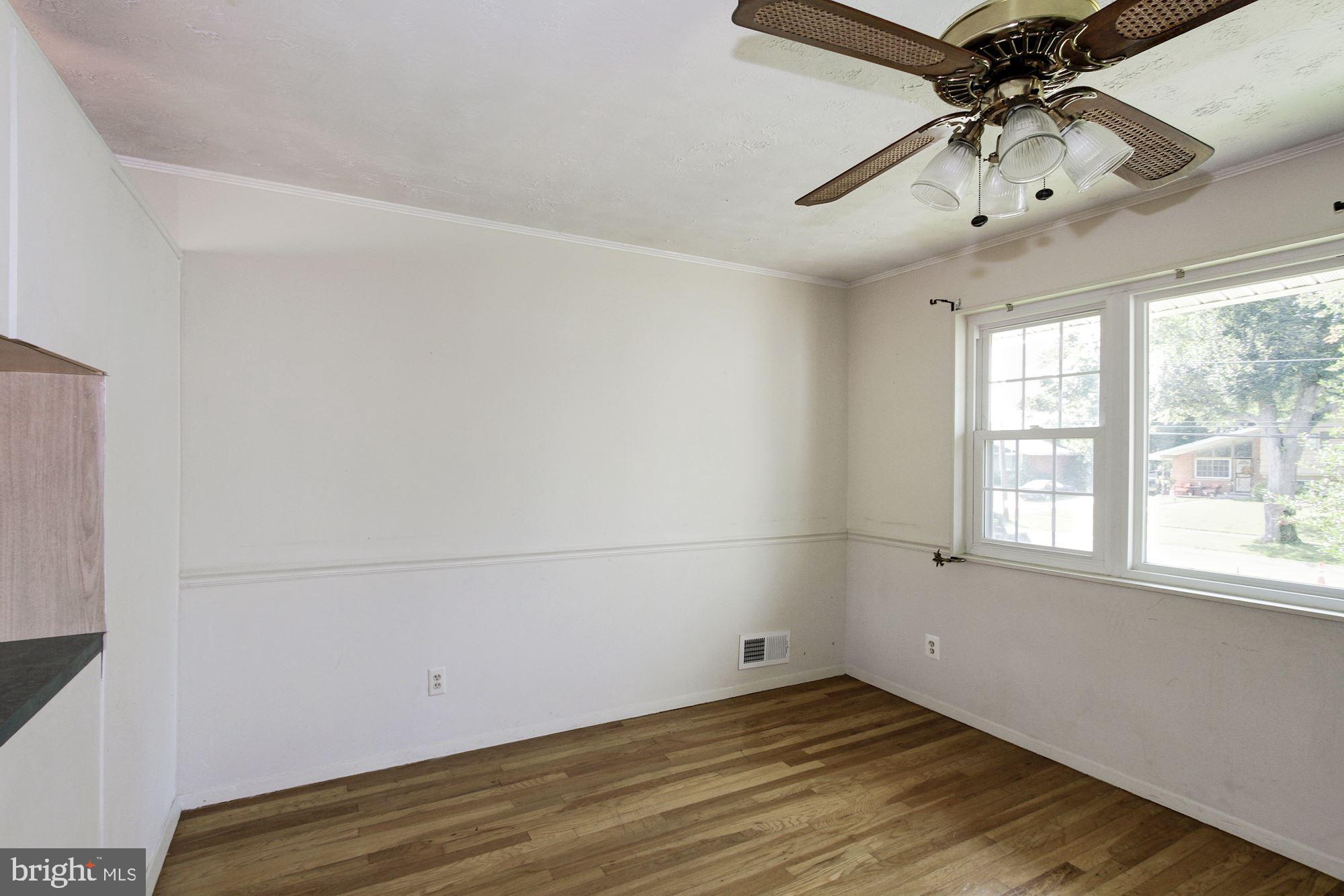 4113 Ferrara Drive Silver Spring, MD 20906 - Photo 14 of 40 dining area off of kitchen, with wood floors