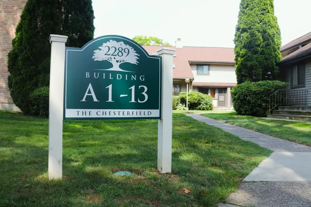 a sign on the side of the road