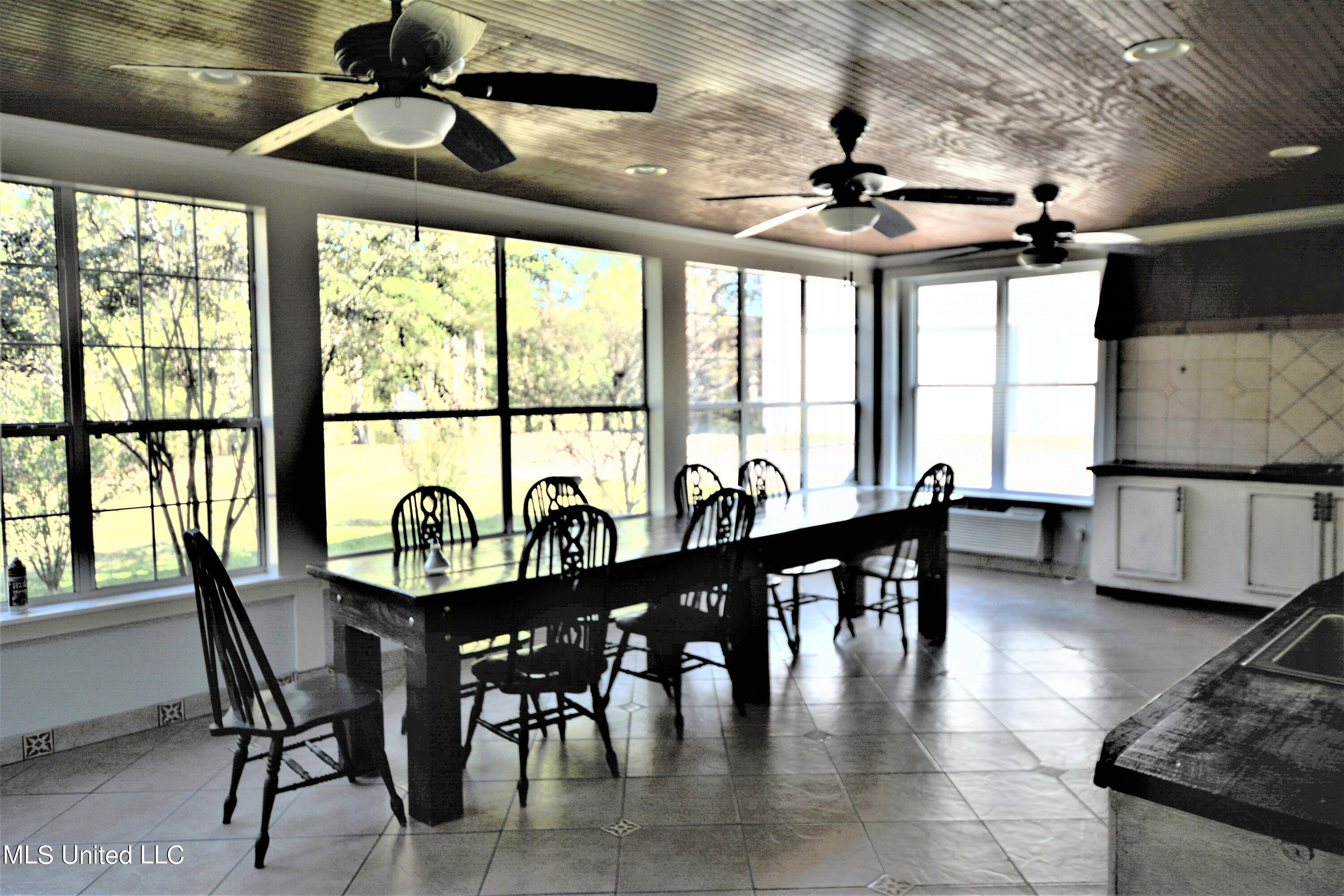 1925 Gwynn Road Nesbit, MS 38651 - Photo 12 of 33 Sun Room Kitchenette