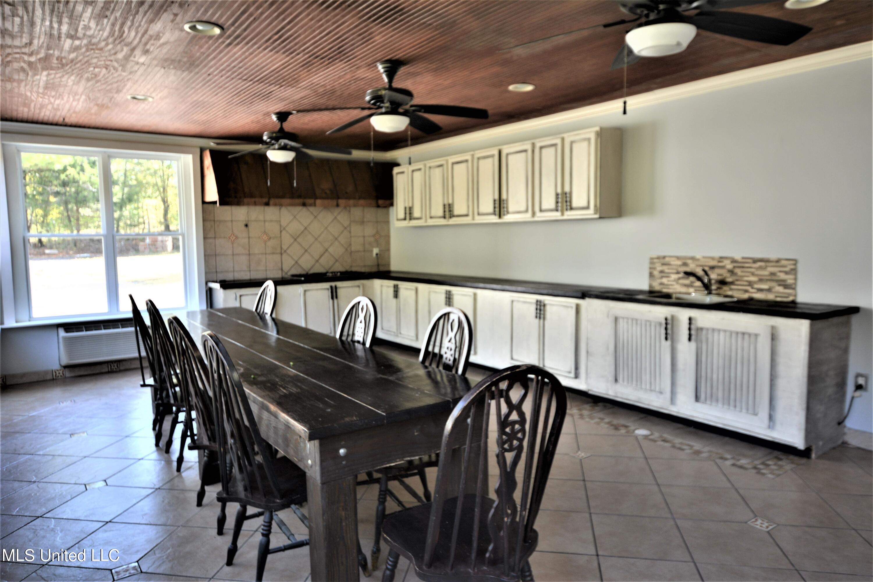1925 Gwynn Road Nesbit, MS 38651 - Photo 13 of 33 Sun Room Kitchenette