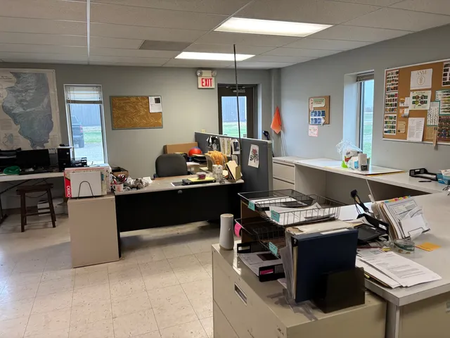 a room with a table and chairs