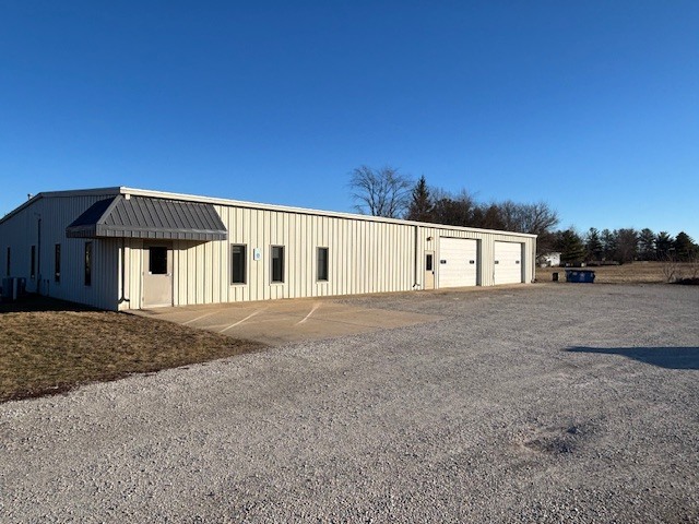 2106 County Road 1000 East Champaign, IL 61822 - Photo 2 of 26 a front view of a house with a yard