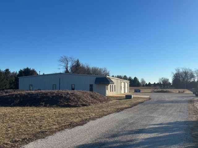 2106 County Road 1000 East Champaign, IL 61822 - Photo 3 of 26 a view of a dry yard with wooden fence