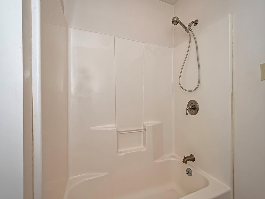 1694 Dime Road Vandergrift, PA 15690 - Photo 34 of 35 a bathroom with a bath tub with a shower