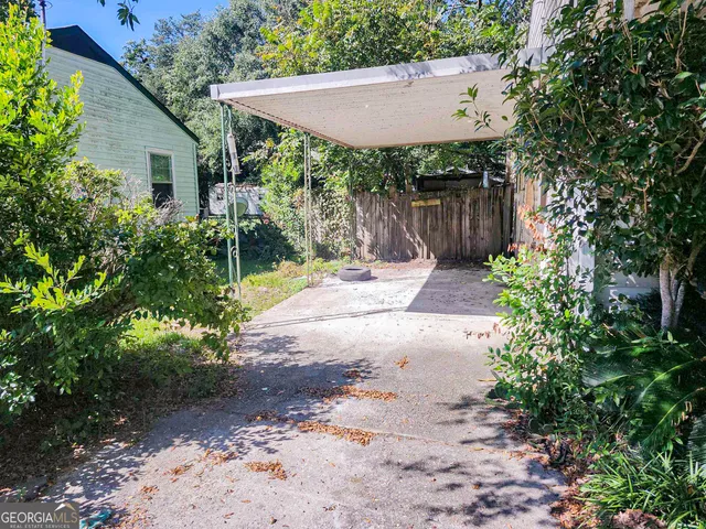 a backyard of a house with seating space