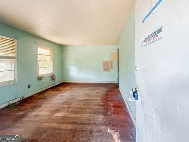 a view of an empty room and window