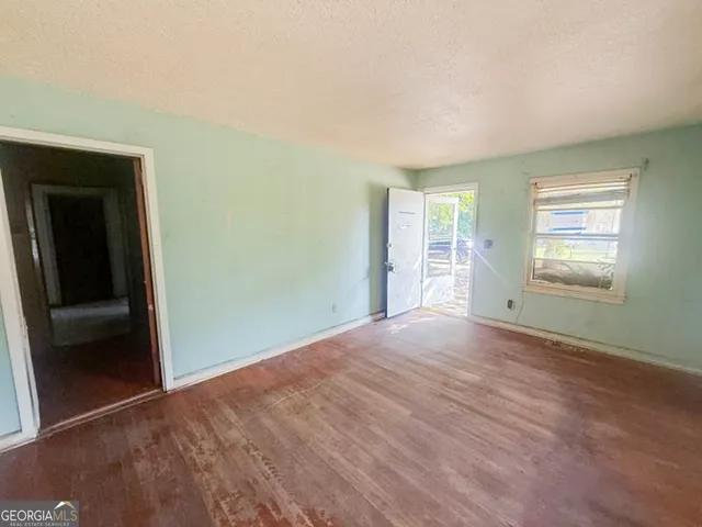 an empty room with windows