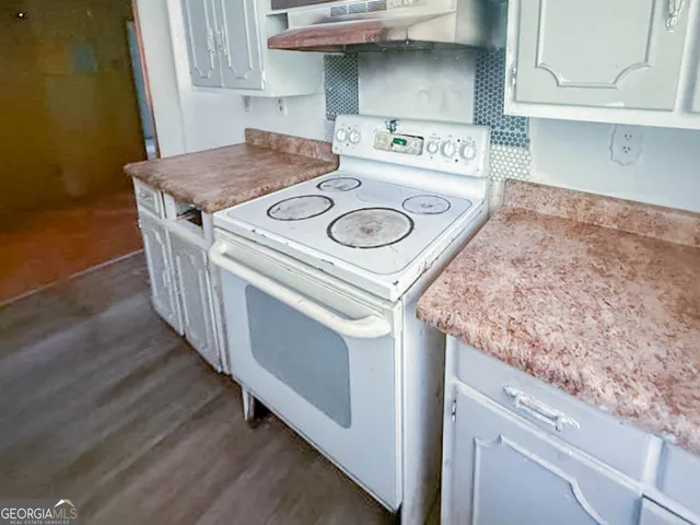 a utility room with washer and dryer