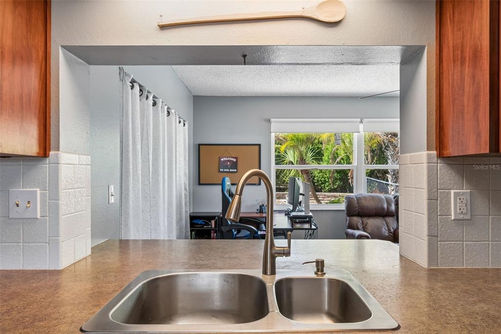 5478 Waycross Drive Spring Hill, FL 34606 - Photo 14 of 29 a kitchen with a sink cabinets and a window