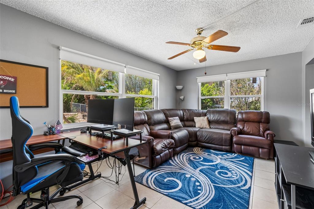 5478 Waycross Drive Spring Hill, FL 34606 - Photo 18 of 29 a living room with furniture and a window