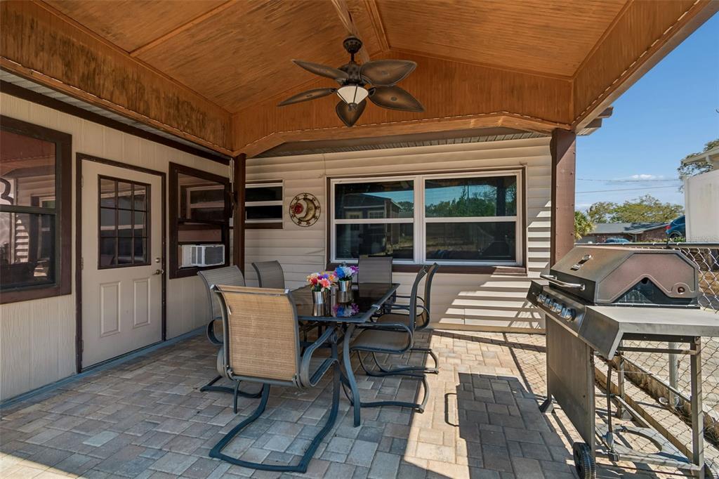 5478 Waycross Drive Spring Hill, FL 34606 - Photo 24 of 29 a dining room with furniture and a potted plant