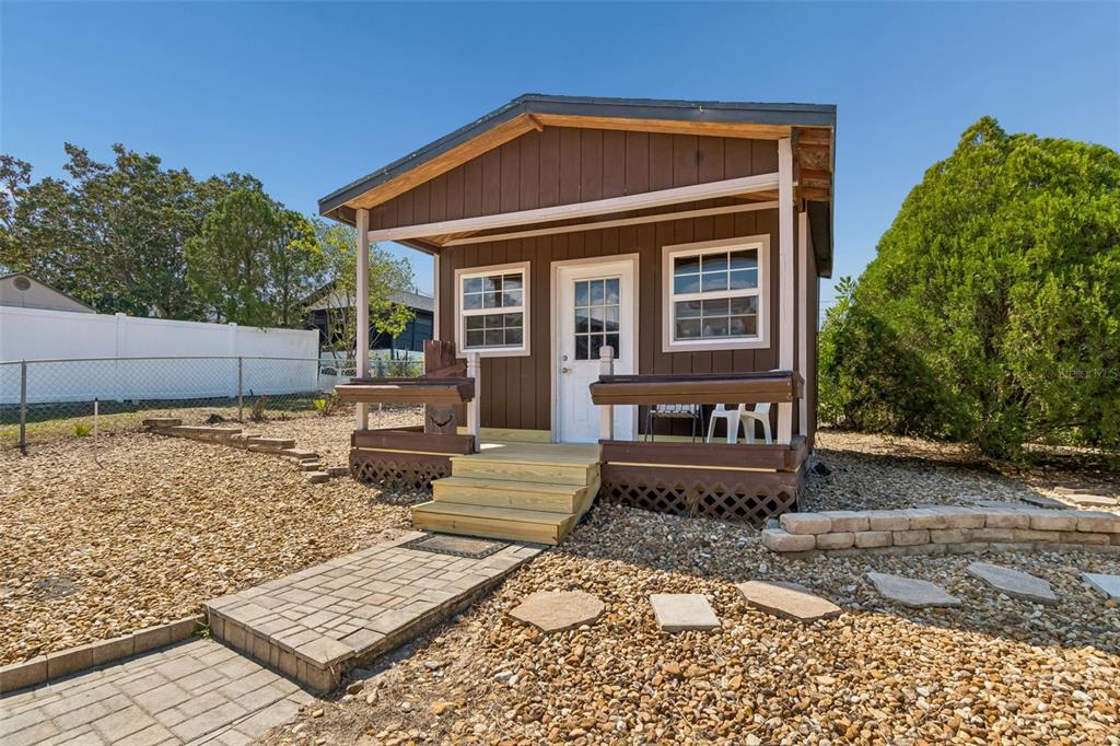 5478 Waycross Drive Spring Hill, FL 34606 - Photo 27 of 29 a front view of a house with garden
