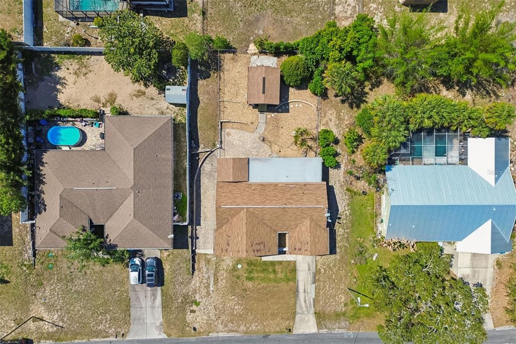 5478 Waycross Drive Spring Hill, FL 34606 - Photo 29 of 29 an aerial view of a house with a yard and large trees