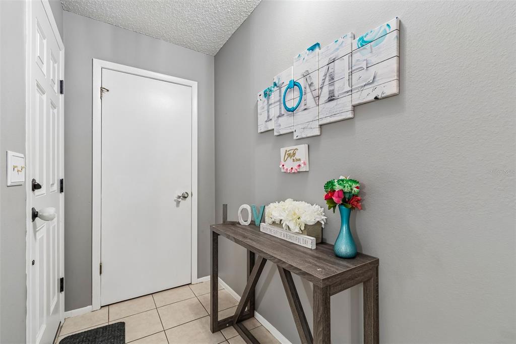 5478 Waycross Drive Spring Hill, FL 34606 - Photo 4 of 29 a table room that has a table and a shelf in it