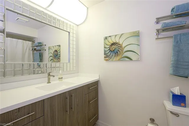 a lobby with furniture and potted plant