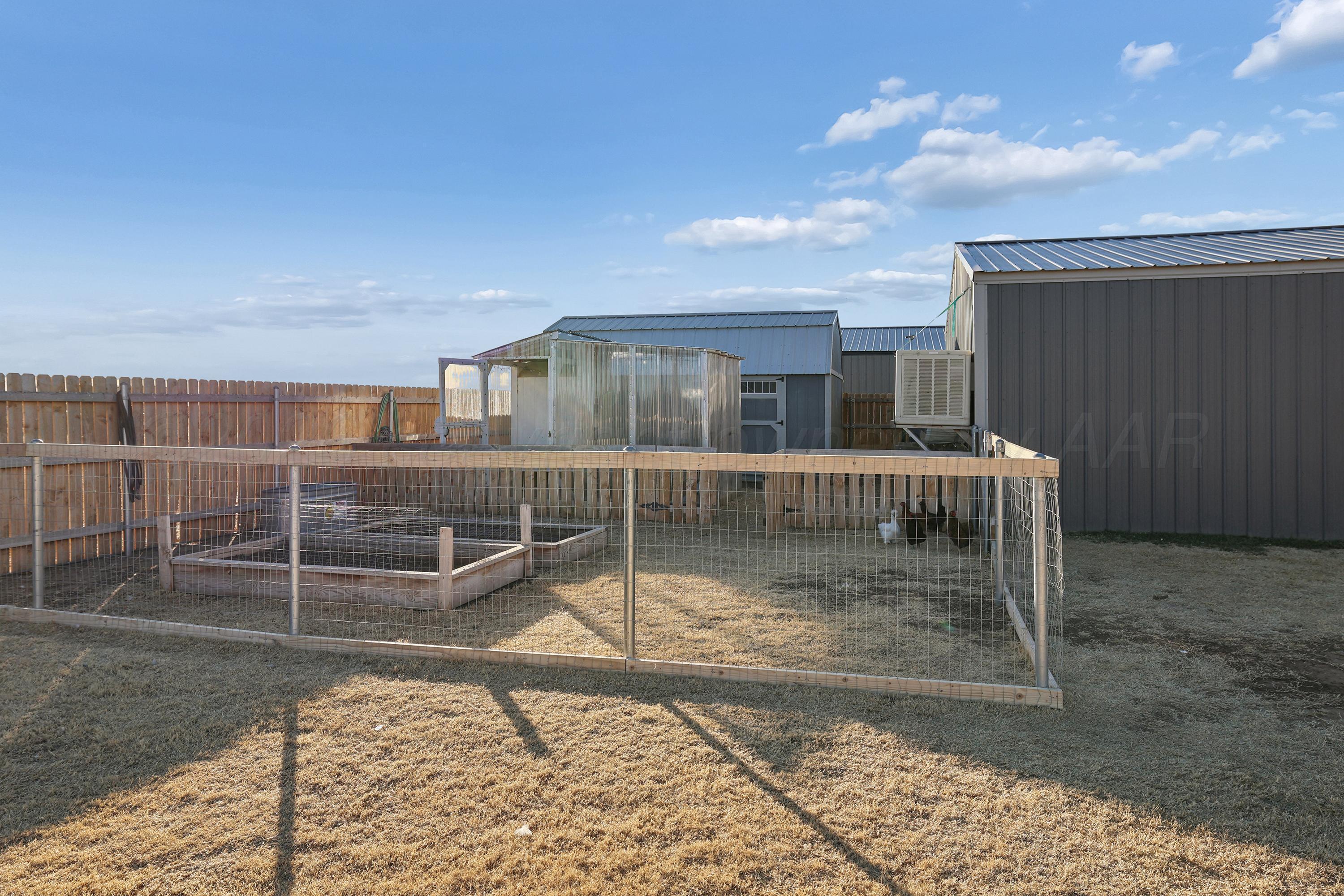 9715 Mossberg Street Canyon, TX 79015 - Photo 26 of 32 a view of a backyard