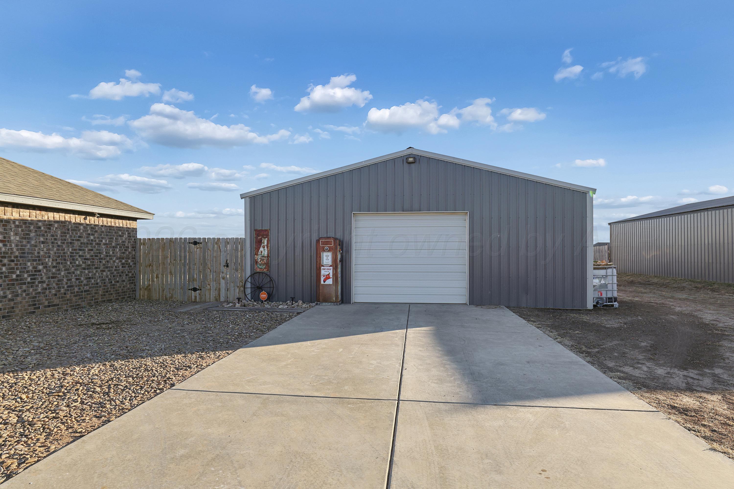 9715 Mossberg Street Canyon, TX 79015 - Photo 5 of 32 a view of a house with a backyard