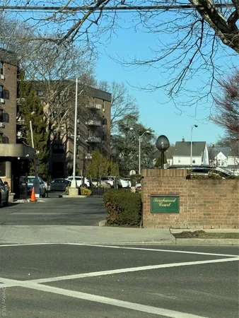 a view of a street with houses