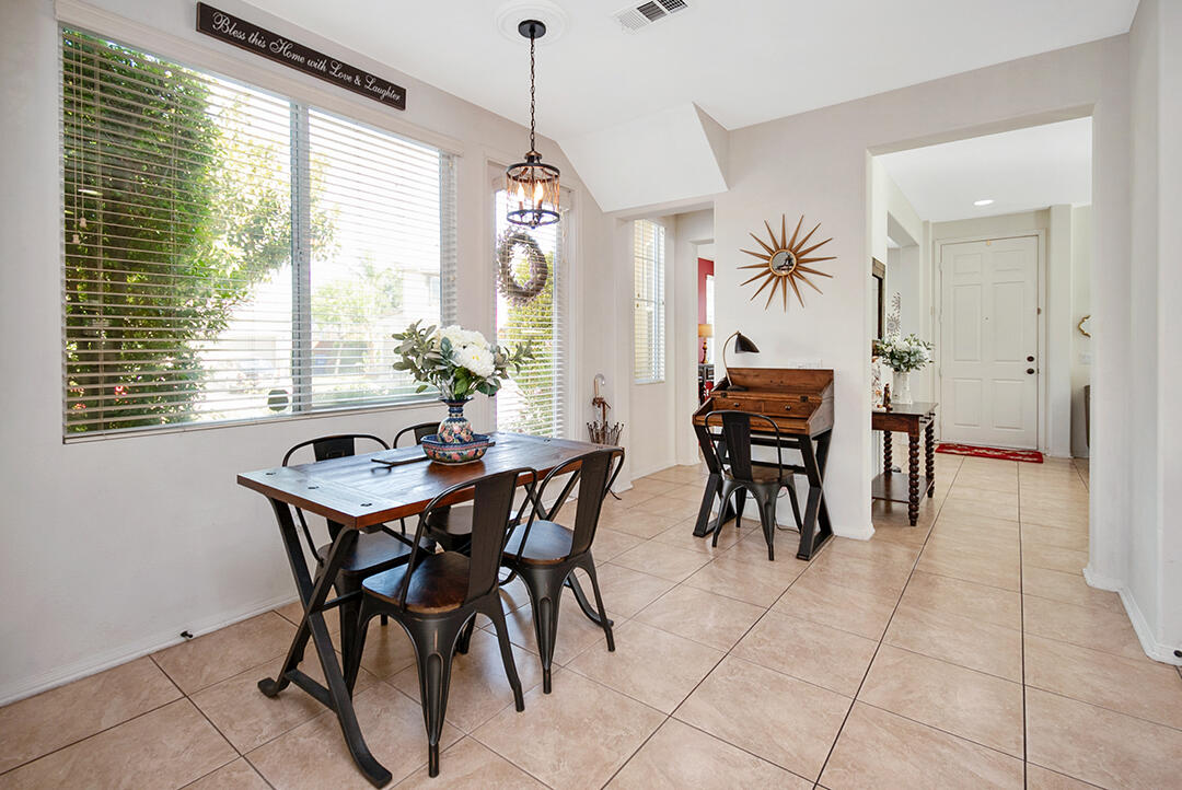 28938 Mirada Circulo Valencia, CA 91354 - Photo 11 of 56 a dining room with furniture and window