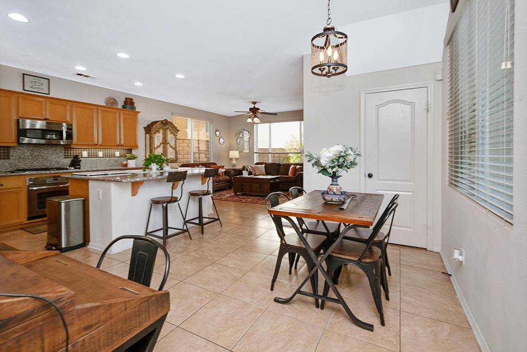 28938 Mirada Circulo Valencia, CA 91354 - Photo 12 of 56 a dining room with furniture and window