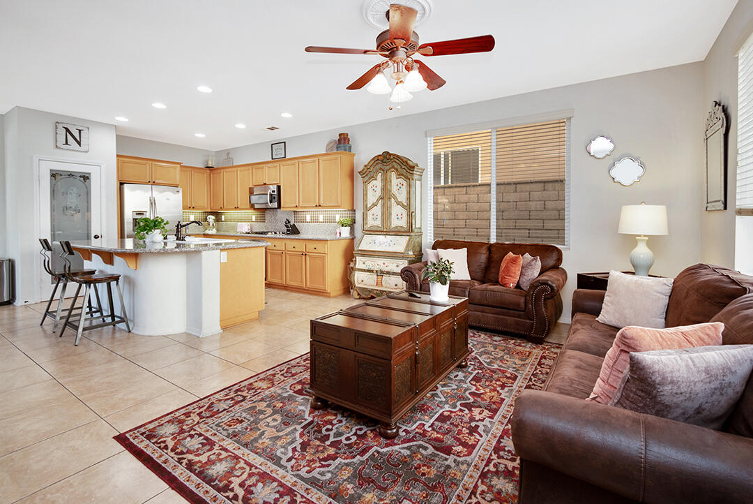 28938 Mirada Circulo Valencia, CA 91354 - Photo 19 of 56 a living room with furniture and a rug