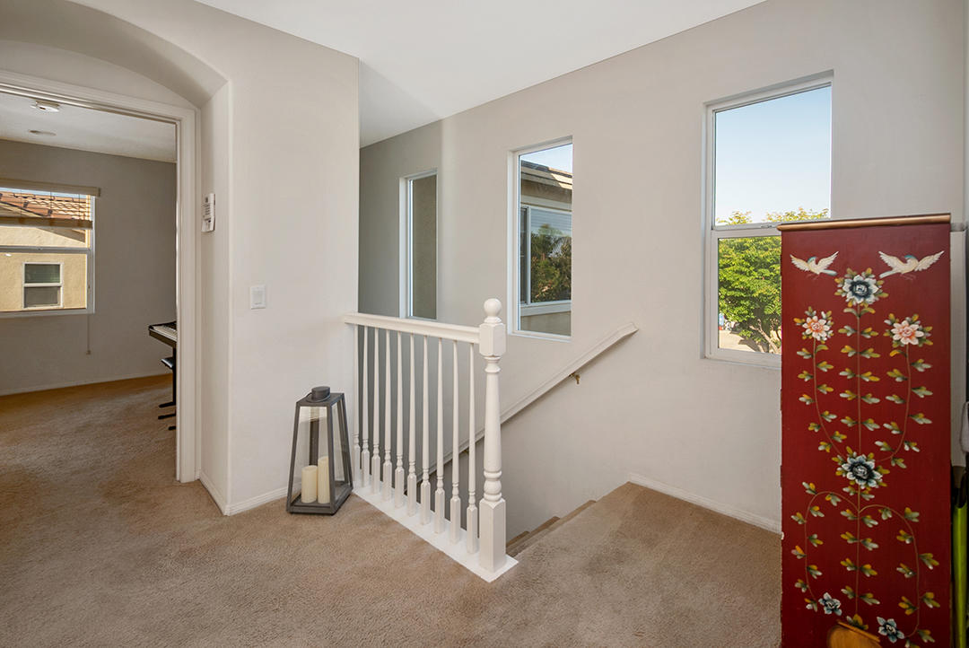 28938 Mirada Circulo Valencia, CA 91354 - Photo 21 of 56 a view of a room with a window and stairs