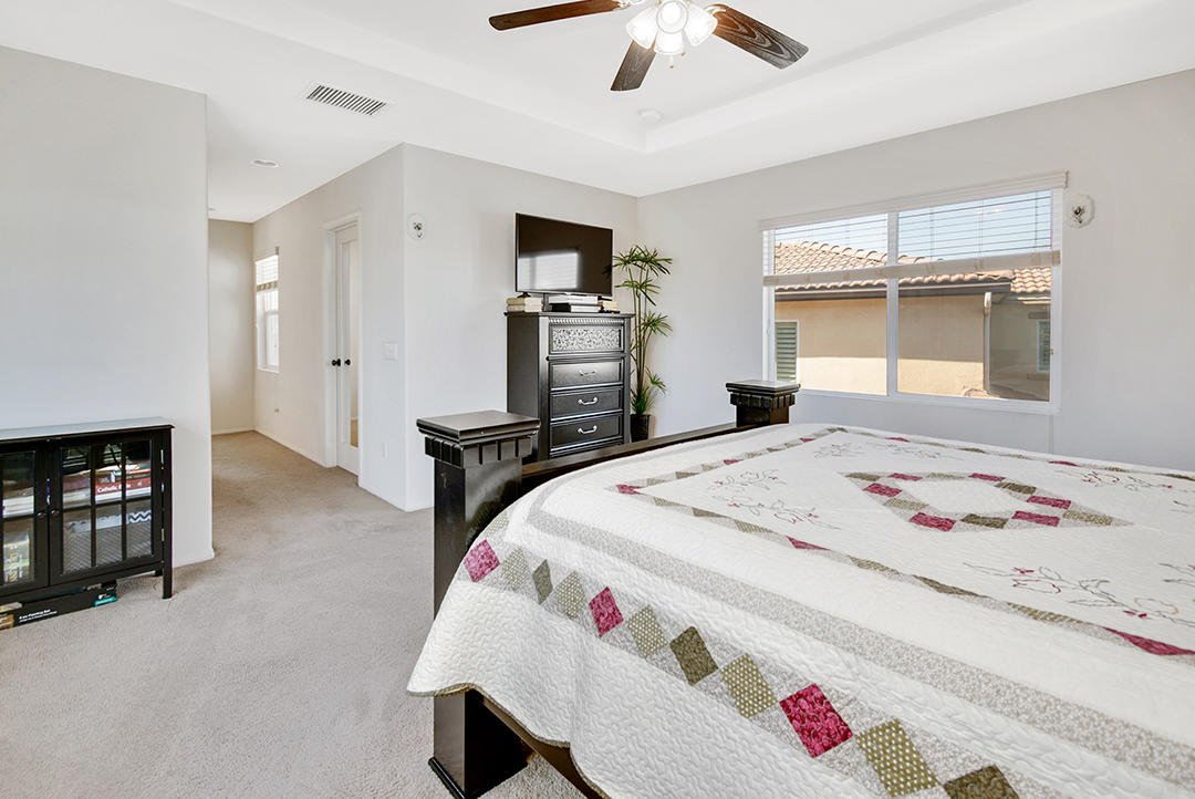 28938 Mirada Circulo Valencia, CA 91354 - Photo 22 of 56 a bedroom with a bed and a window