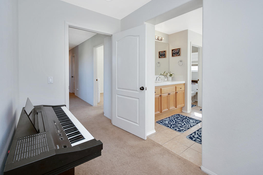 28938 Mirada Circulo Valencia, CA 91354 - Photo 26 of 56 a view of room with rug and wooden floor